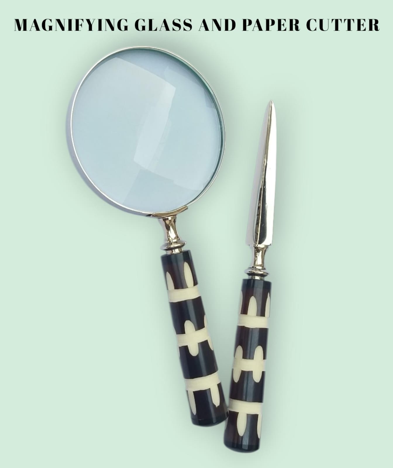 MAGNIFYING GLASS AND PAPER CUTTER